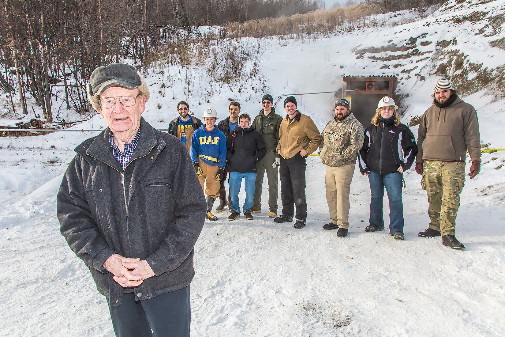 Garth Anderson joins mining students who were restarting work at the Silver Fox Mine in 2014. Anderson’s father, Tury, staked the claims after World War II and donated them to UAF in 1977. The mine is located off the Elliott Highway near its intersection with Old Murphy Dome Road. Students are in charge of the mine, which gives them real-life experience with the challenges in running a safe, efficient operation. UAF photo by Todd Paris