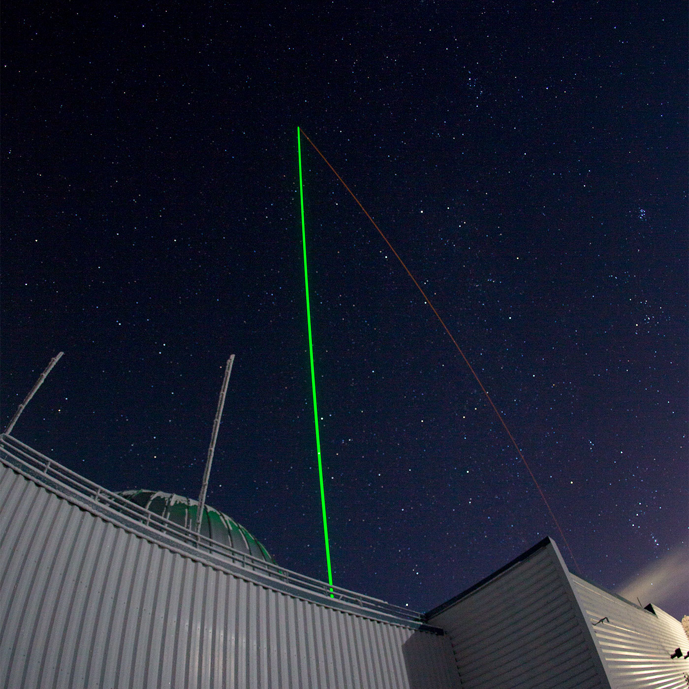 A lidar beam, consisting of a laser and radar, shoots 50 miles into the stratosphere to help monitor conditions before a rocket launch at UAF’s Poker Flat Research Range about 30 miles north of Fairbanks in January 2015. UAF photo by Todd Paris