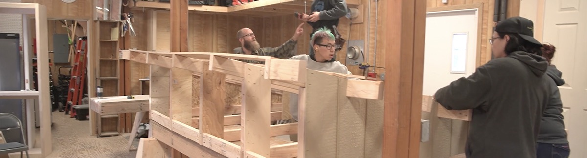 students frame a shed in their Construction Trades Technology course
