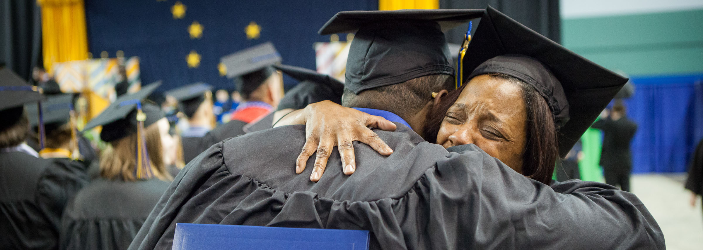 graduation hug