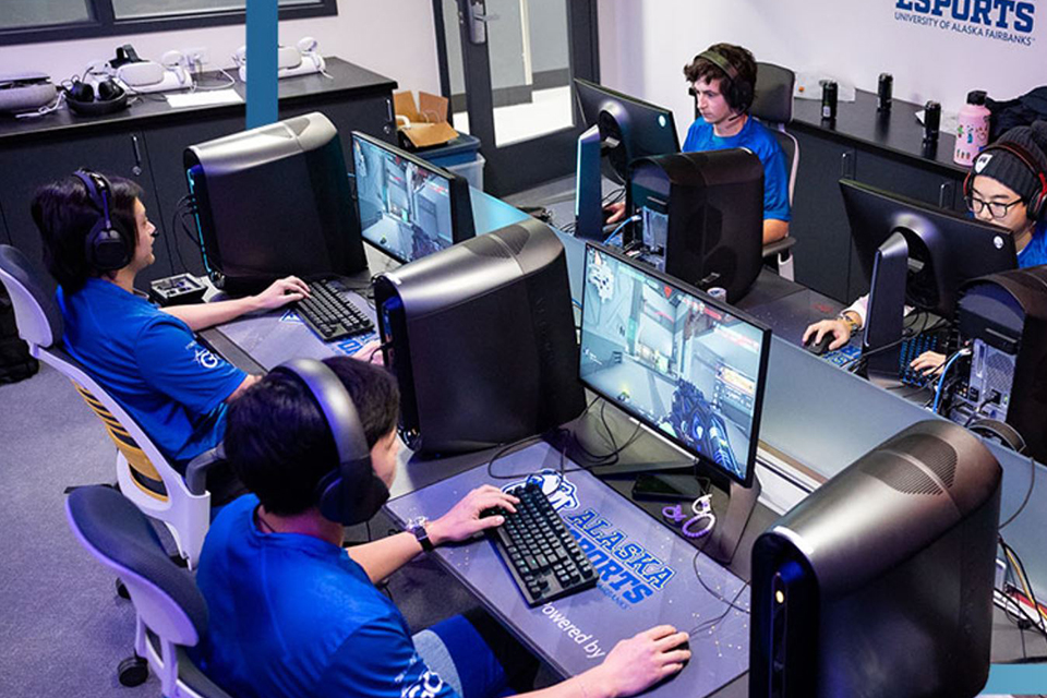 Nanook Esports Blue Team competes in a game of Valorant at the Alaska Esports Center, 10/19/22. (UAF photo by Leif Van Cise)