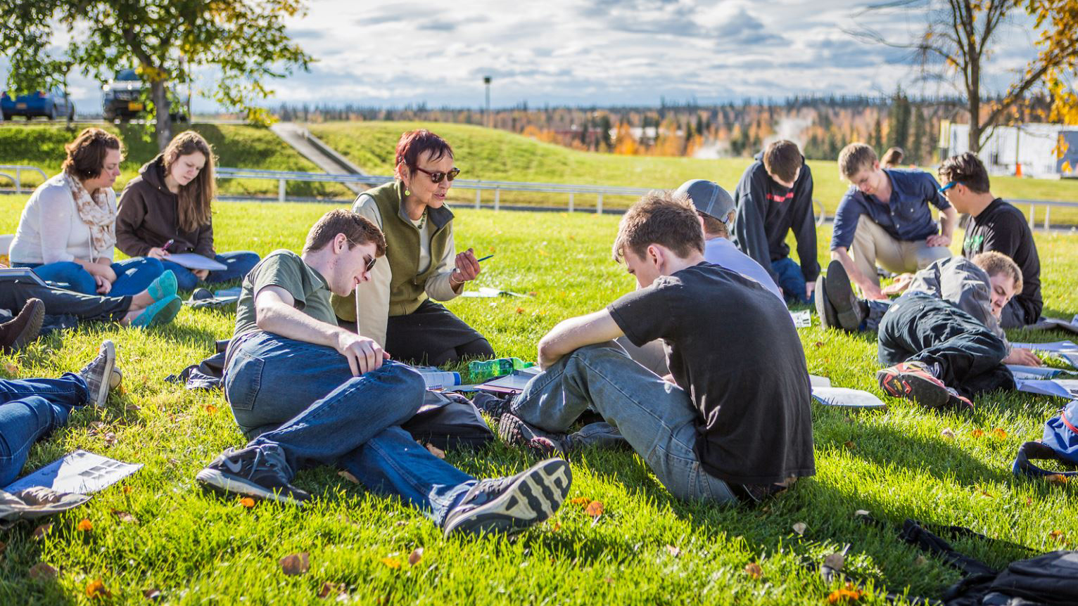 A German class held outdoors on a sunny day | UAF Photo
