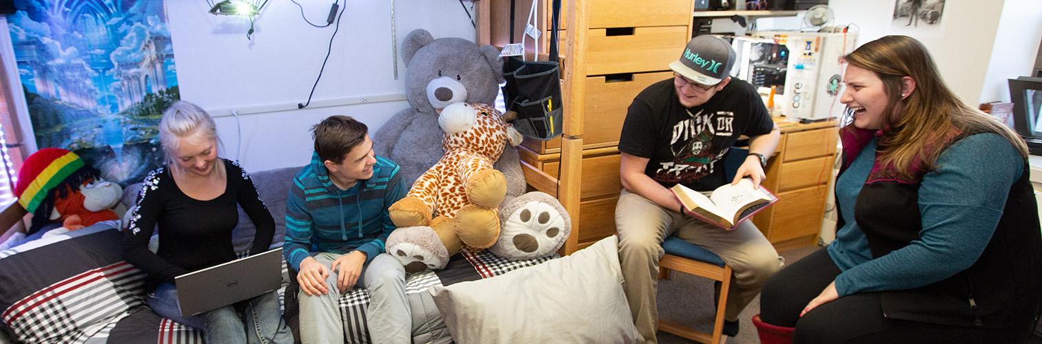 Students in a MBS dorm room
