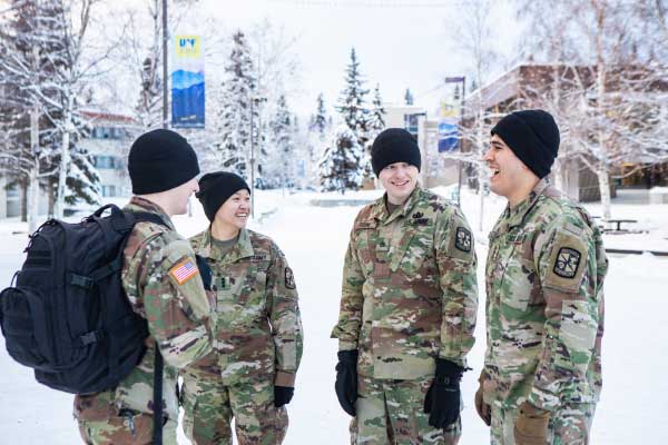 ROTC students walking across campus in the winter