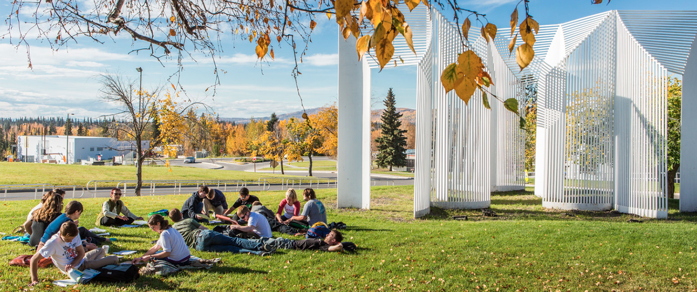 A German foreign language class holds class on the campus lawn during a warm autumn afternoon. | UAF Photo by JR Ancheta