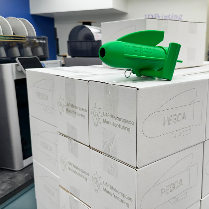 3D printed device on top of MakerSpace boxes