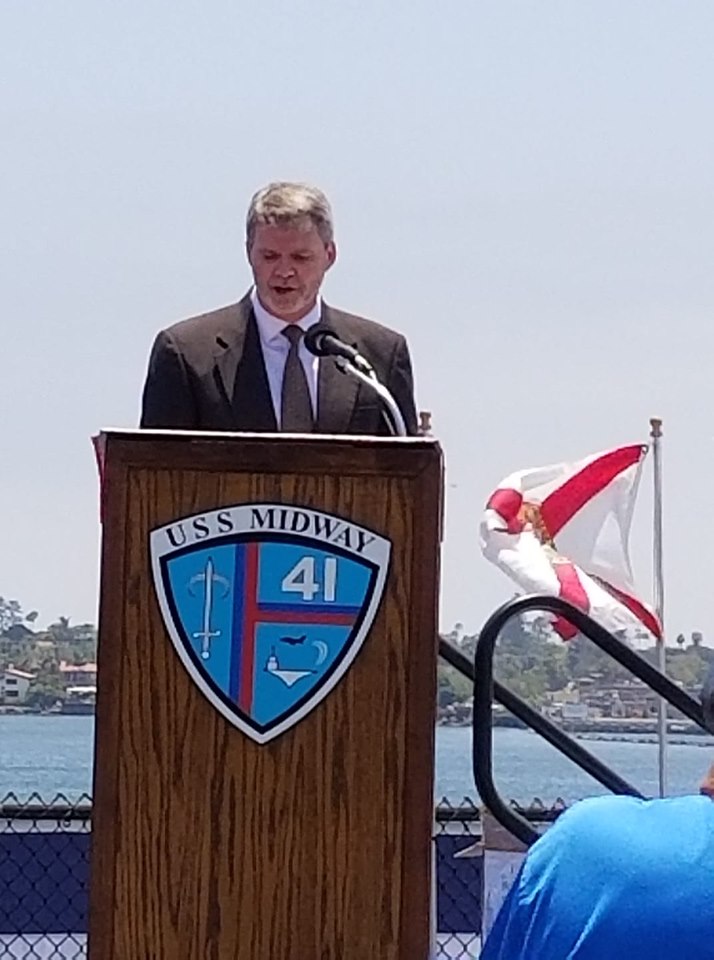A man behind a podium giving a speech.