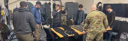 Students collaborate with Service Members