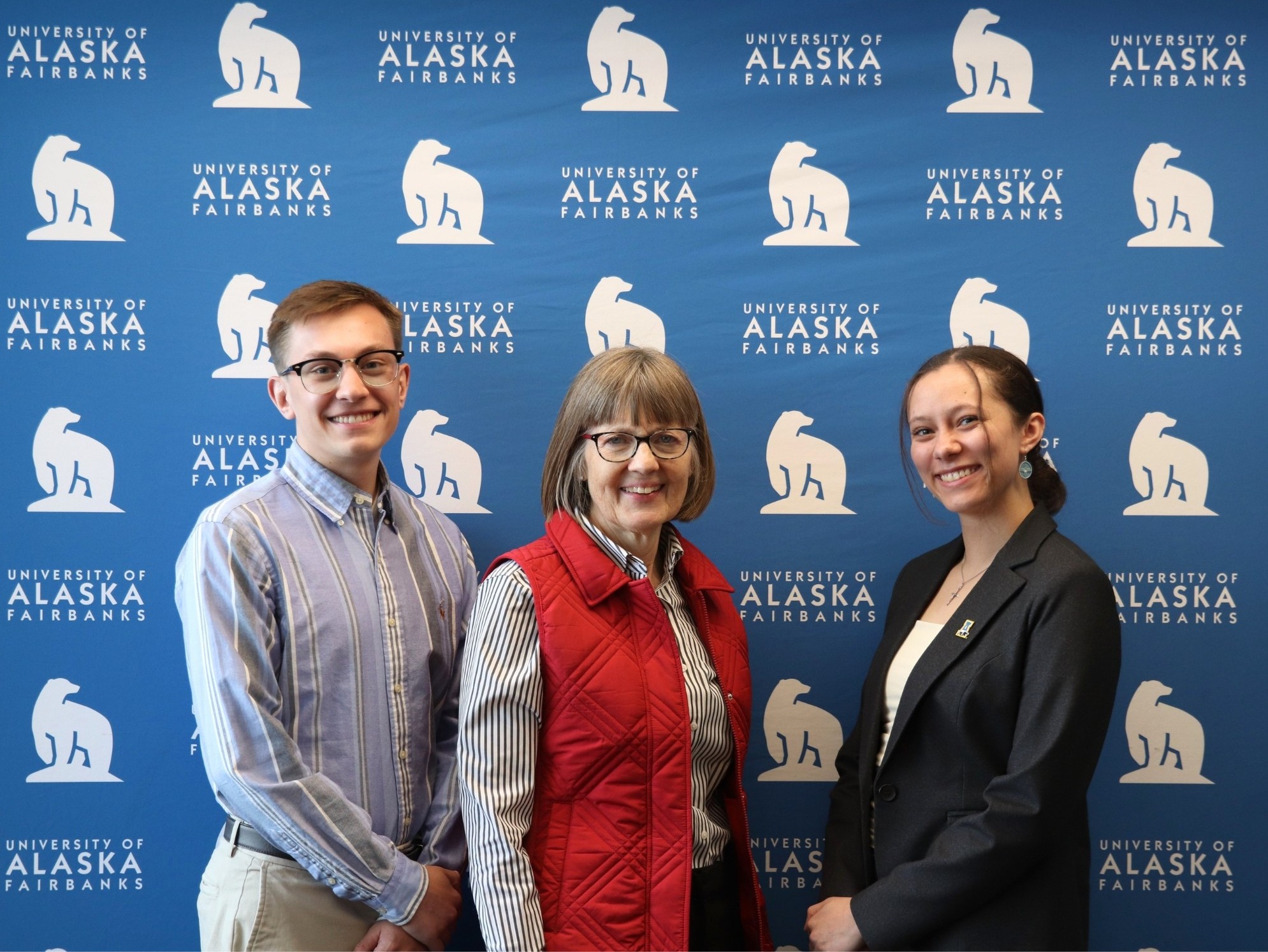 Meg Nordale, second from left, stands with UAF College of Business and Security Management students and ASUAF officers Jackson Nelson and Lael Bartch after being selected for the 2026 Business Leader of the Year award. 