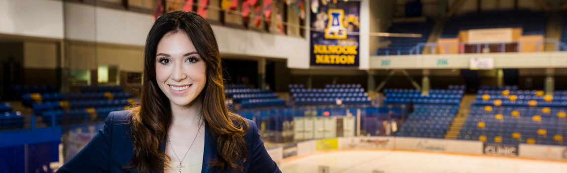 UAF College of Business and Security Management Sports Management student in the Alaska Nanooks Hockey facilities at the Carlson Center