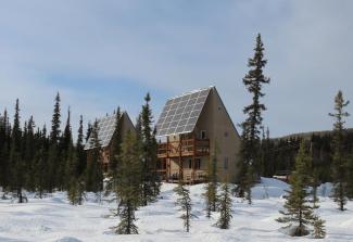 The 5-kilowatt solar arrays on Eric Muehling's cabins together generate over 8,500 kW throughout the year. Photo courtesy of Eric Muehling.