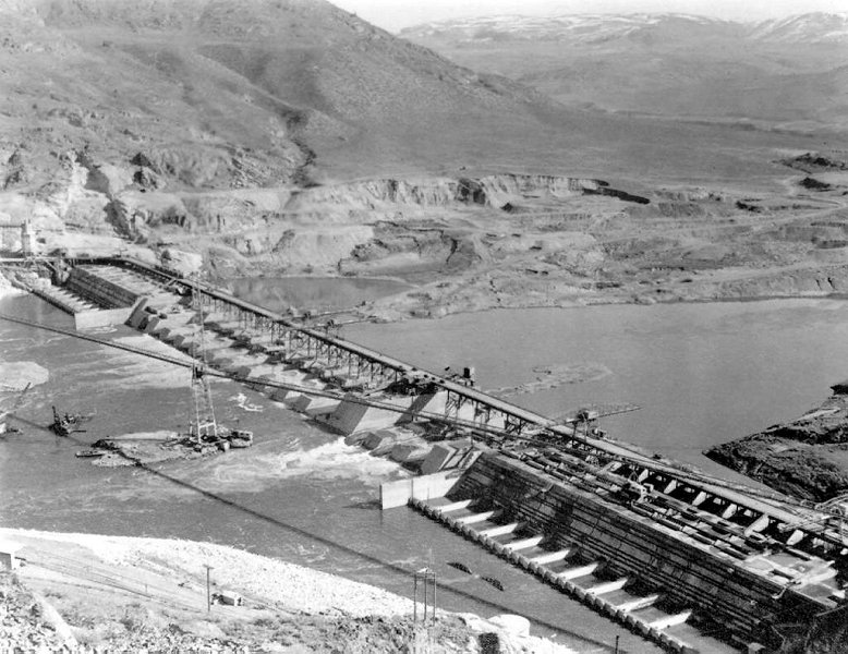 Construction of the Grand Coulee Dam on the Columbia river in Washington state.  Courtesy of Wiki Commons.
