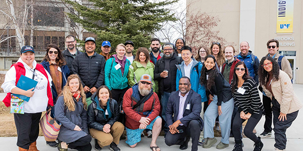 People pose for a group photo