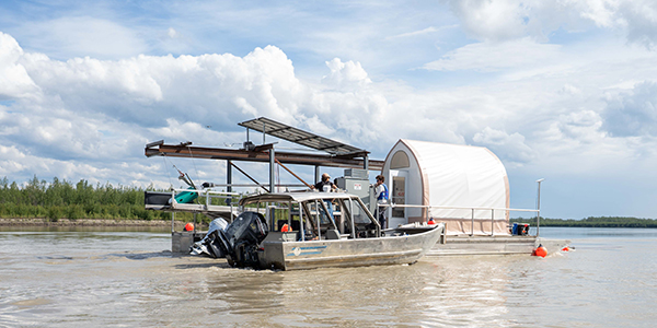 A research barge on a river.