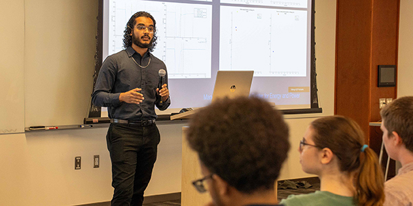 ACEP summer intern Manuel Gutiérrez gives a presentation on his inverter model project. Photo by Yuri Bult-Ito/ACEP.