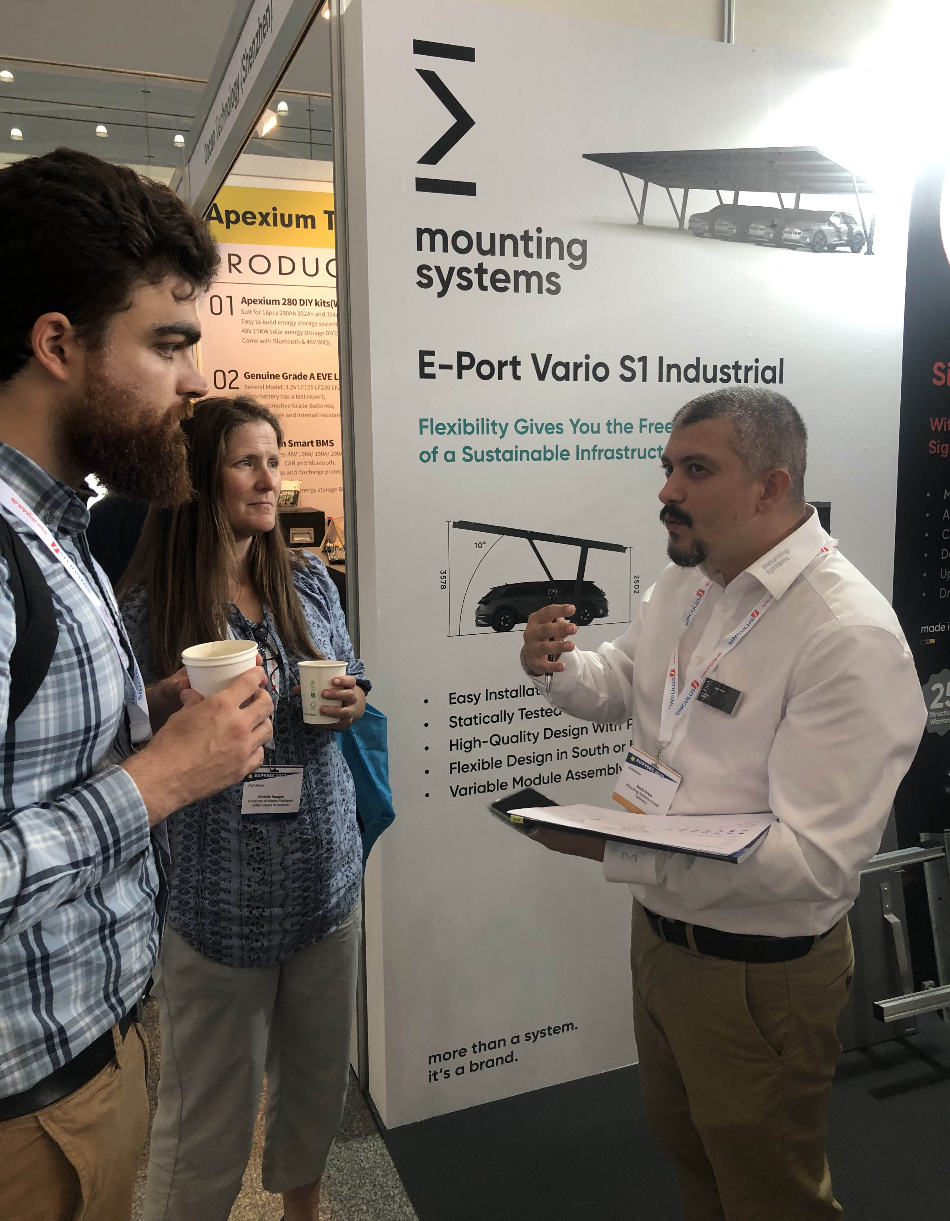 ACEP researchers speak with an industry professional about solar racking at the European Photovoltaic Solar Energy Conference.