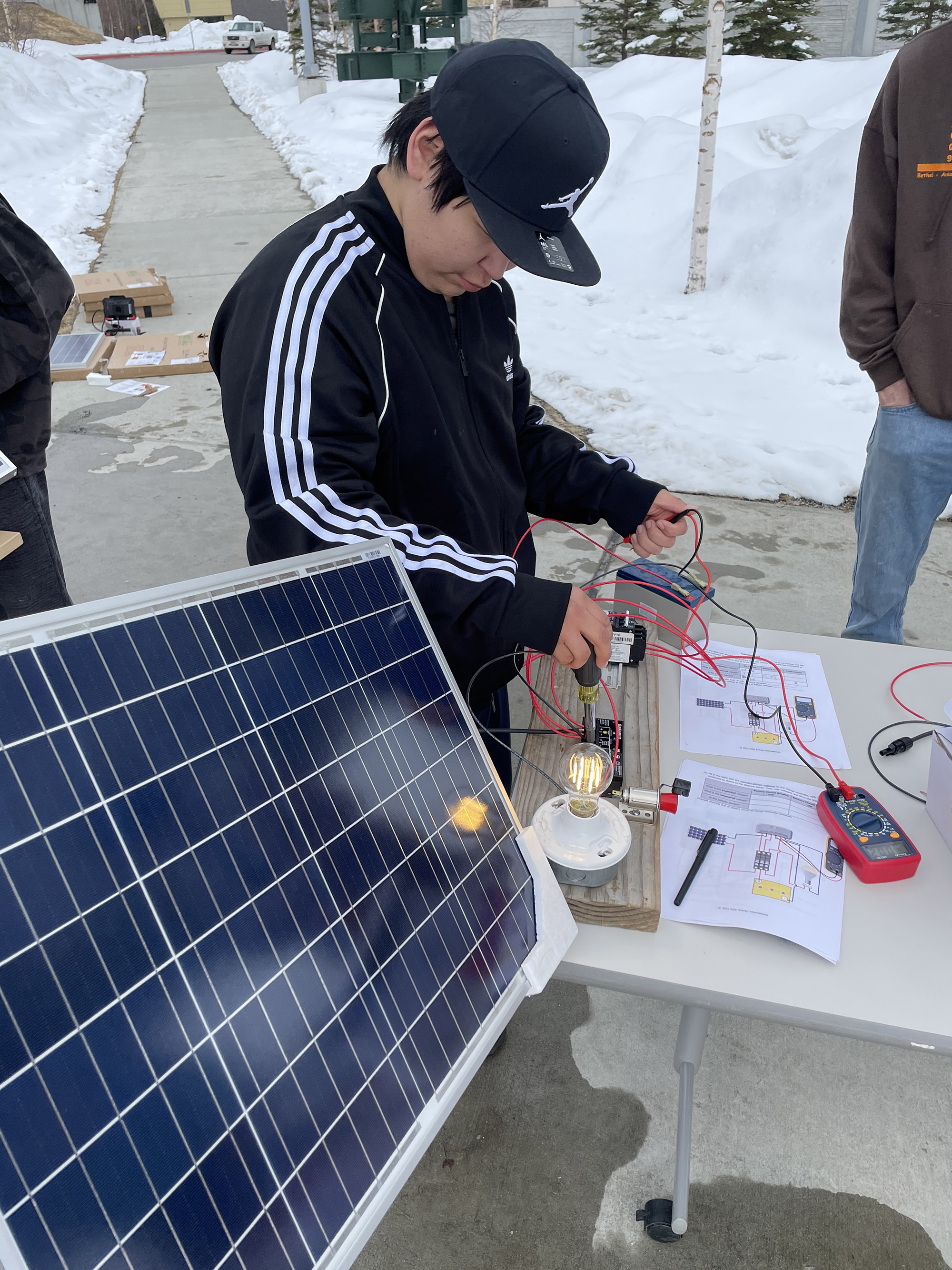 A student builds a stand-alone power system.