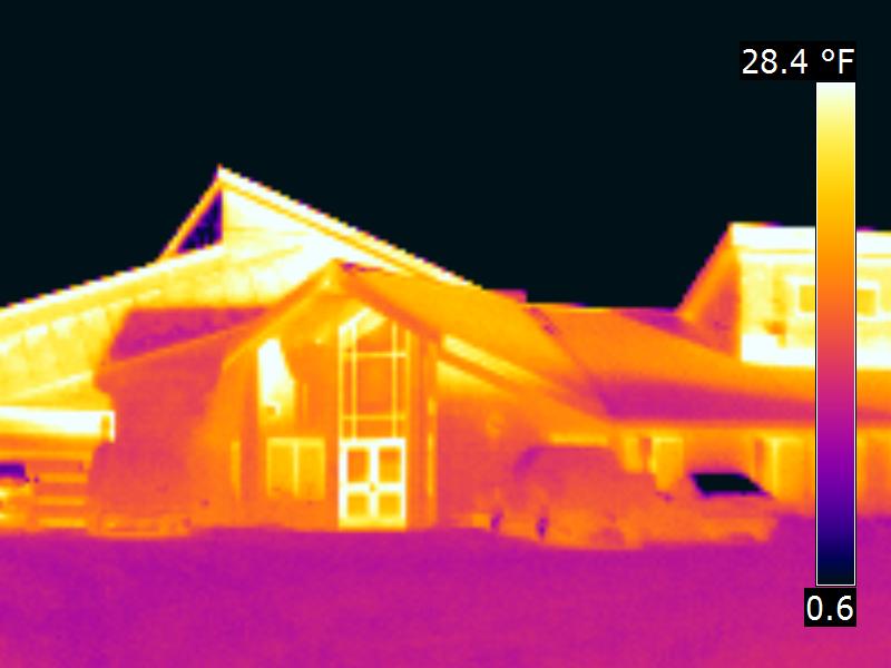 An infrared image showing heat loss from a building.