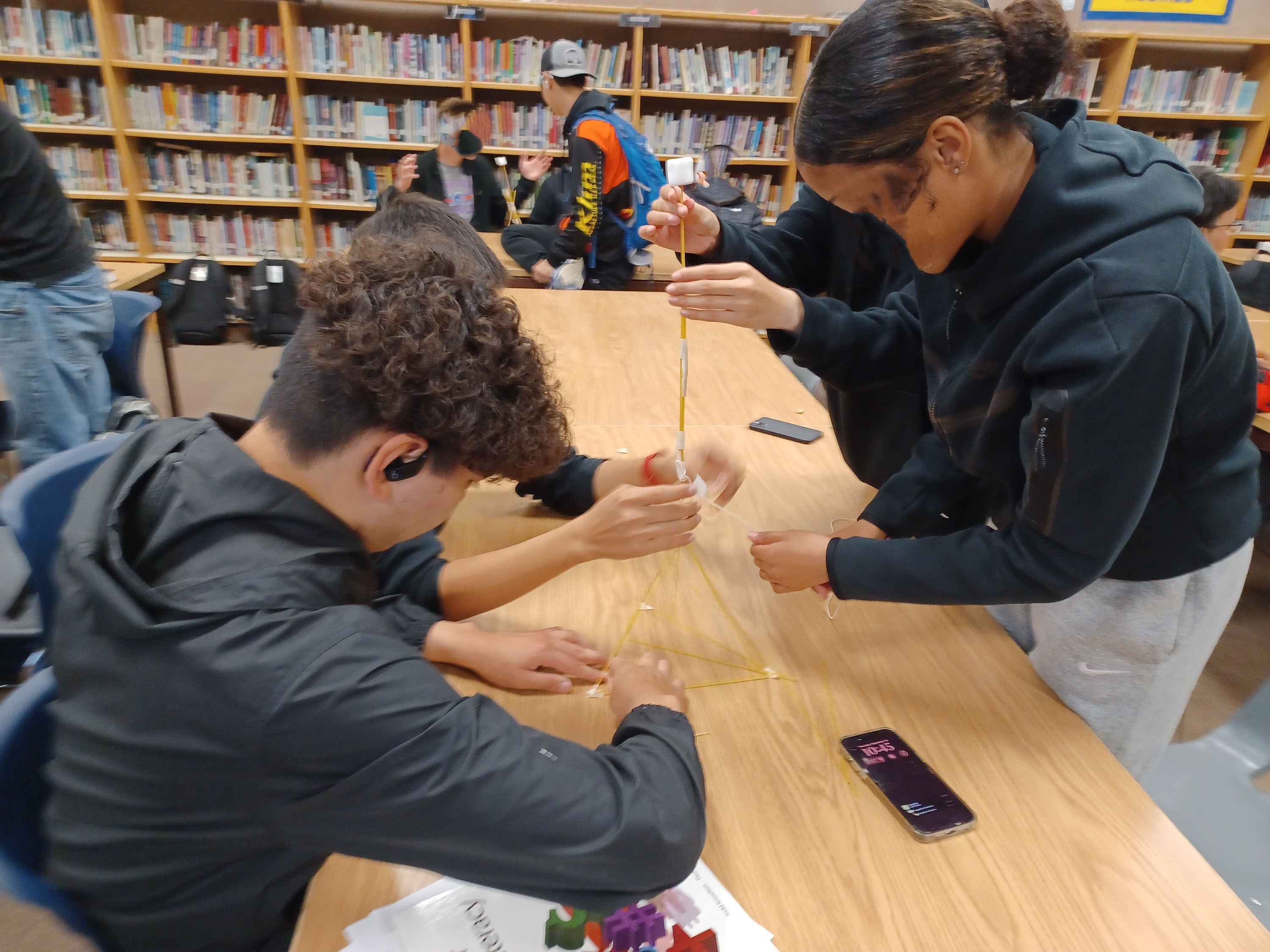 Kotzebue students engage in the Marshmallow Challenge.