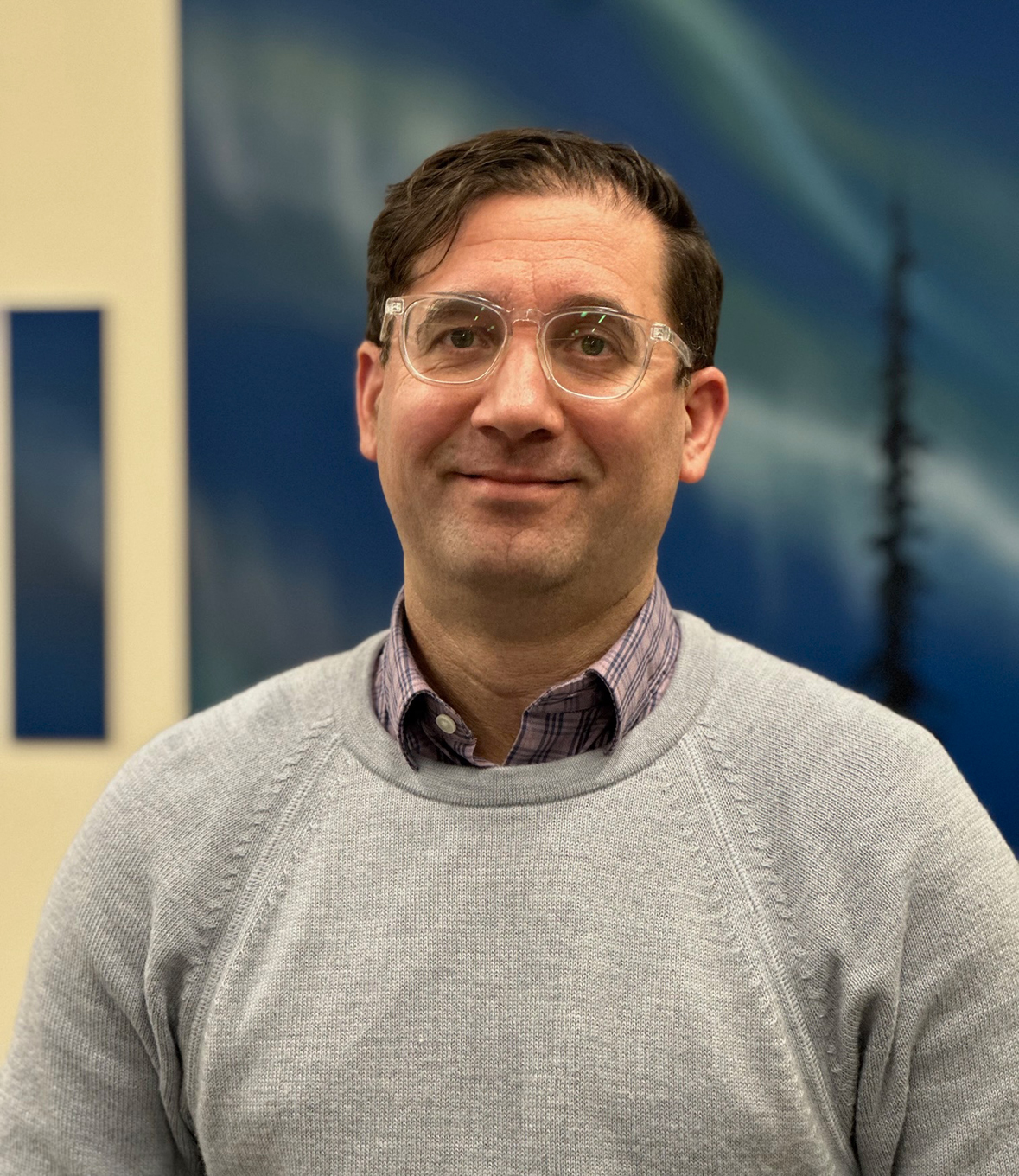 A person poses for a photo