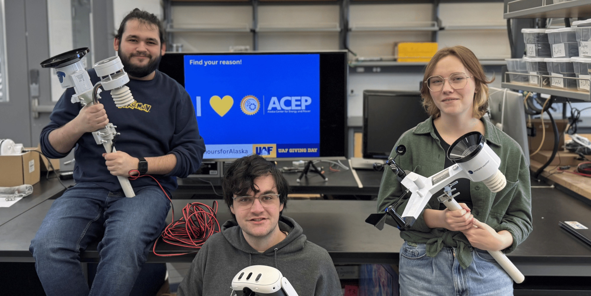 Three people pose for a photo