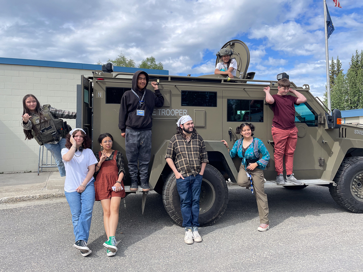 Students participating in the law enforcement program during the summer session pause for a photo