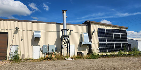 Sustainable Energy Galena Alaska's biomass energy boiler building uses solar panels to generate some power.