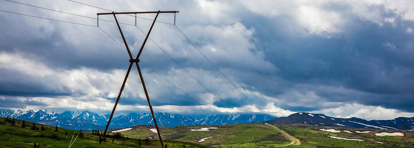 Power pole utility on a mountain range in Alaska