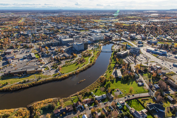 Summer aerial view of the Chena River winding through downtown Fairbanks
