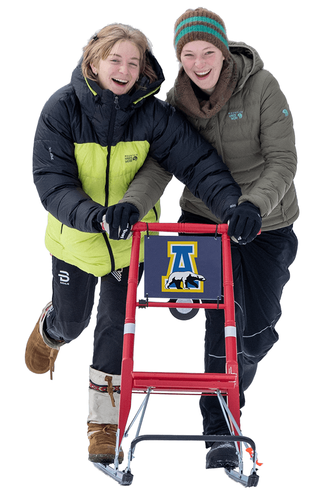 Students on kick sled