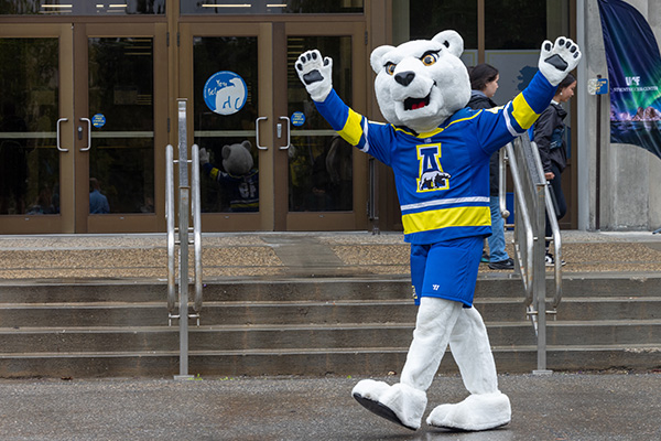 Nanook Mascot walking on campus