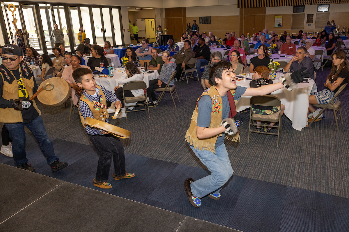 Members of the Troth Yeddha' Dance Group open the ceremony as UAF Alumni gather in the Regents' Great Hall on the UAF campus for the Annual Nanook Rendezvous Alumni Reunion Reception and Alumni Awards Thursday, evening, July 13, 2023.