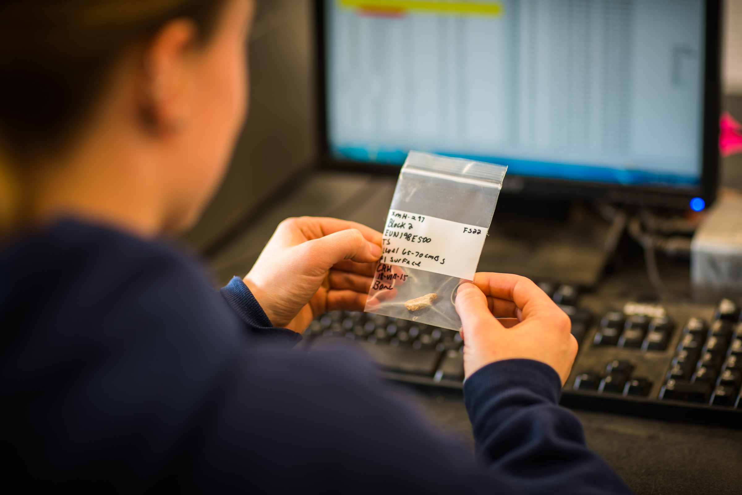 Kaitlyn Fuqua inputs data from last summer's field camp in a Bunnell Building anthropology lab. | UAF Photo by Todd Paris