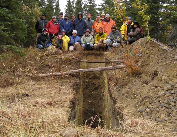 Group photo in front of Beaver Pond Trench Site. Healy, Alaska