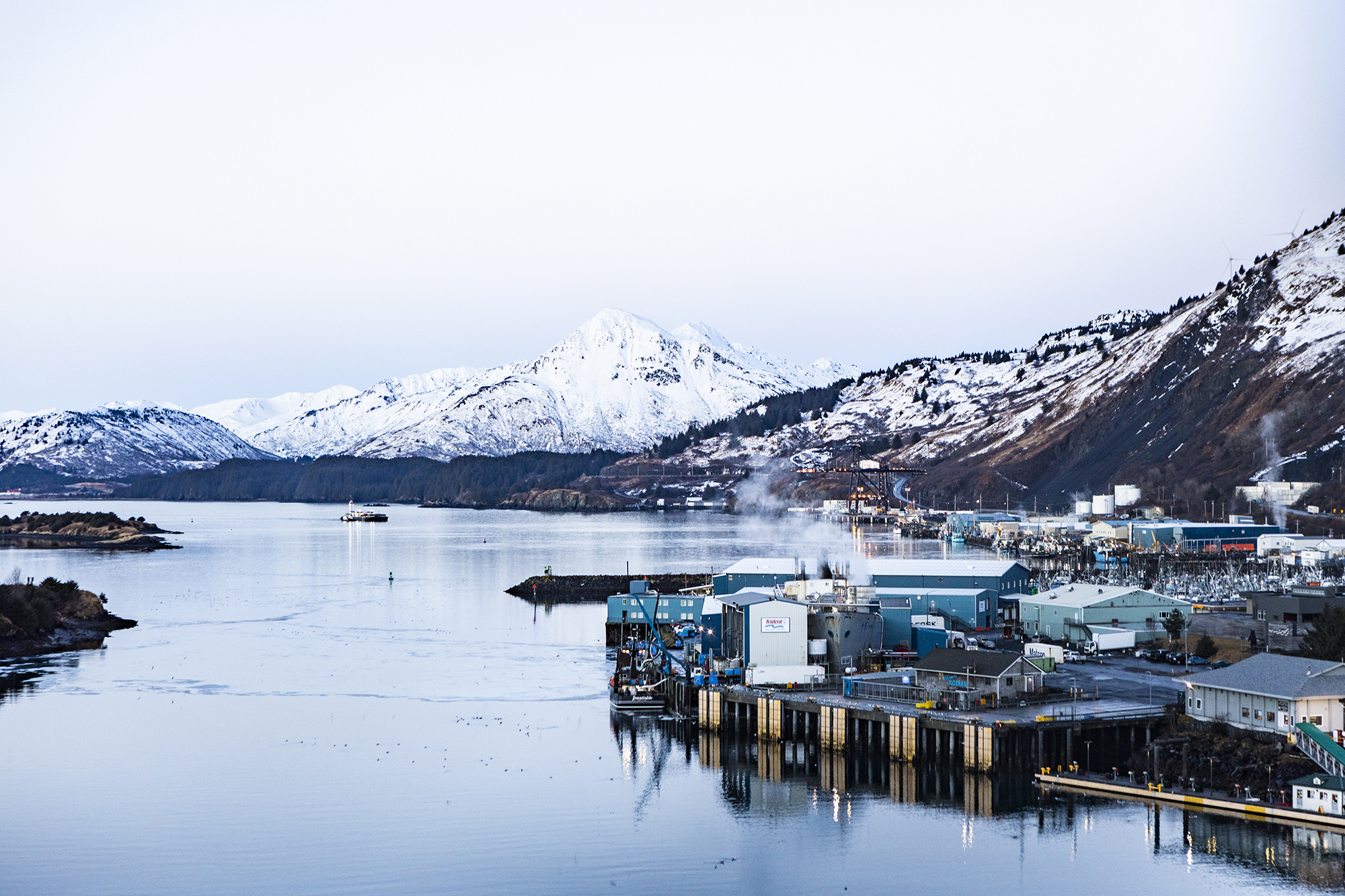 Alaska Sea Grant | A seaside station on the water in front of large snowy mountains | UAF photo by JR Ancheta.