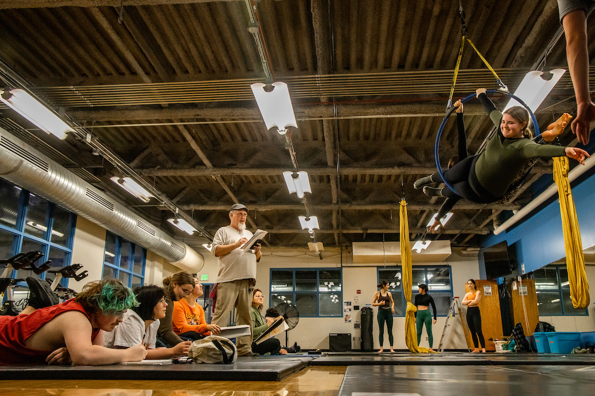 UAF's Art Department drawing instructor James Smith takes his Life Drawing class to an Aerial Arts Club meeting on October 17, 2023 in the Student Recreation Center. | UAF Photo by Marina Santos