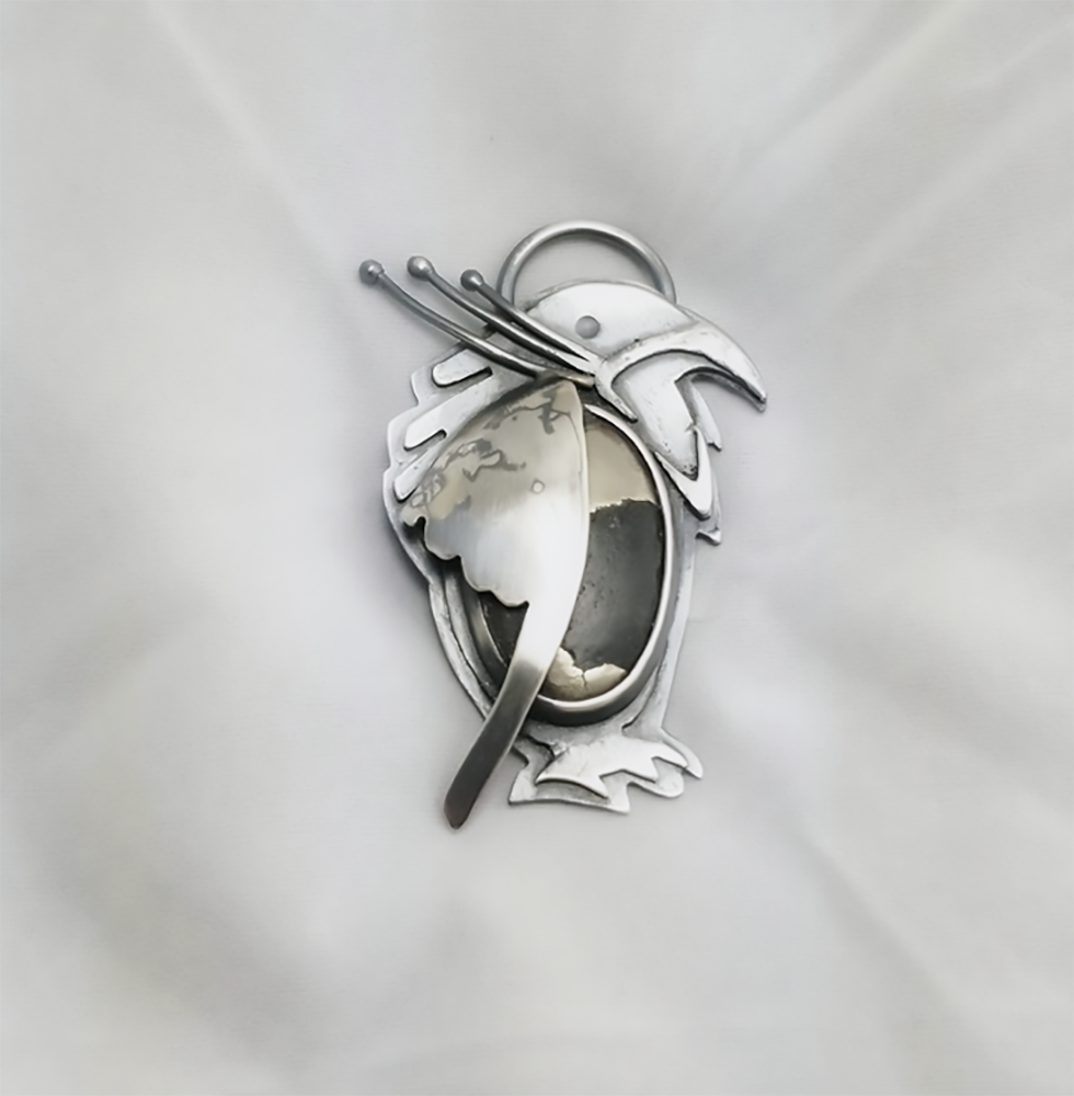 Silver bird inspired by Bosch's Garden of Earthly Delights
