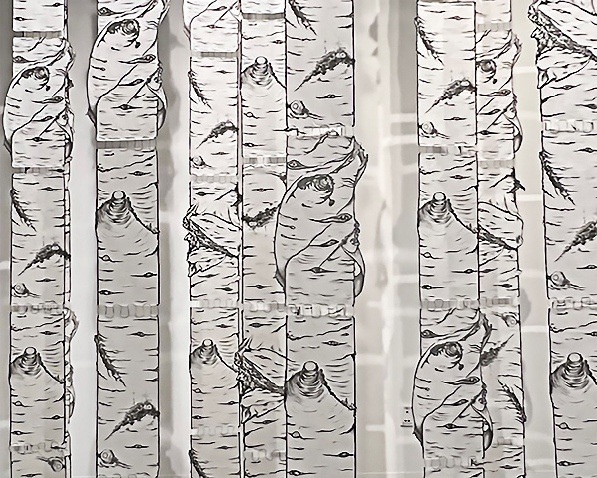 Paper birch trees from Susan Andrews' 2023 M.F.A. thesis exhibition installation, The Cascade Effect. Photo courtesy of Andrews