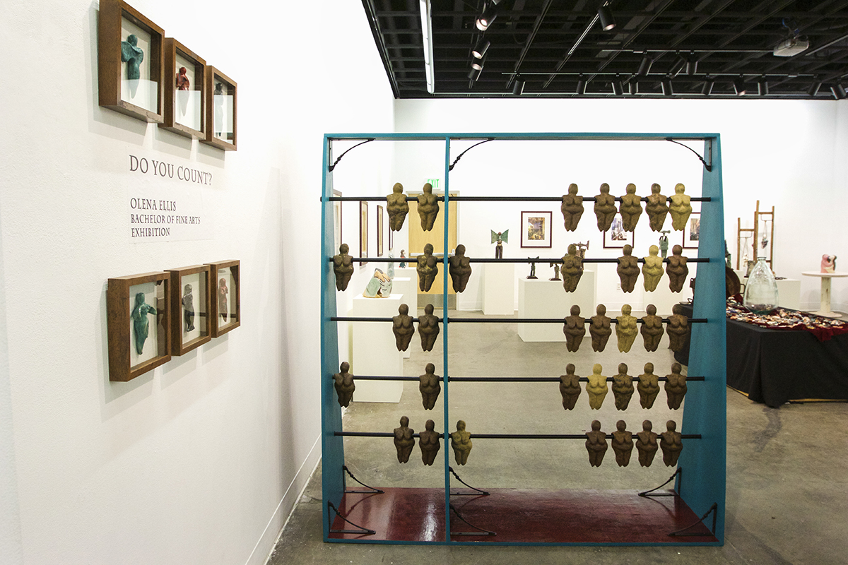 Giant abacus holding ceramic goddess figures