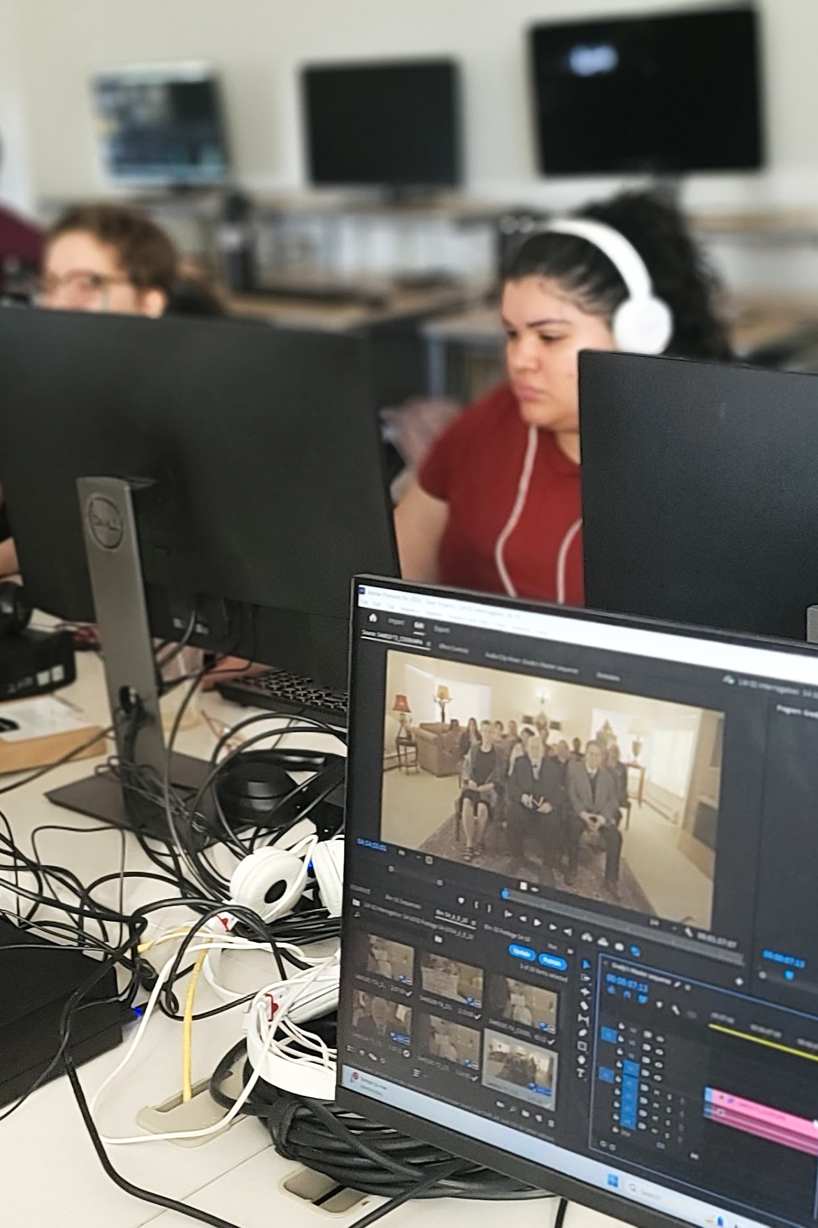Students in a multimedia lab editing Strange Embrace. Photo courtesy of the UAF Department of Theatre and Film