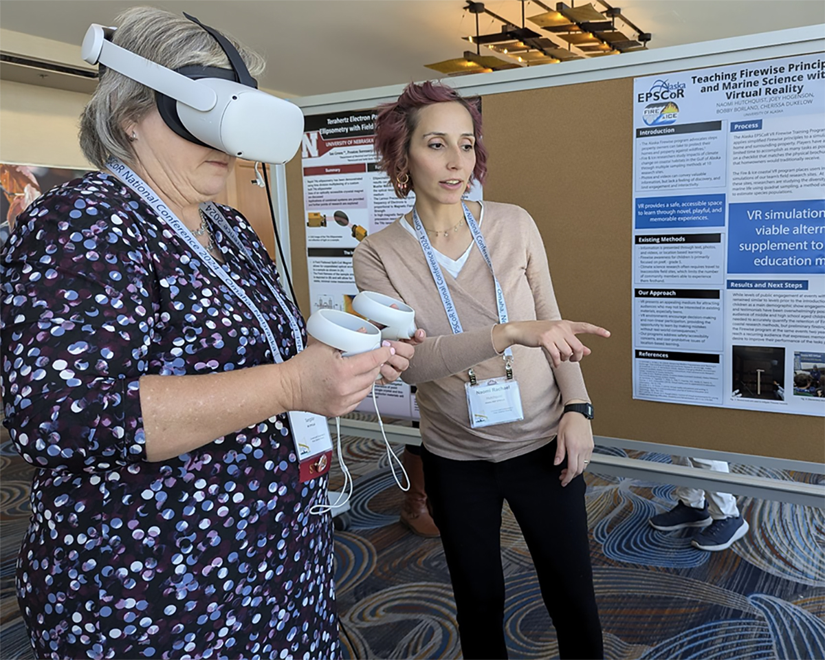 As a Data Visualization Specialist with Alaska EPSCoR, UAF alumna Naomi Hutchquist (’19) demonstrates her VR project on Firewise principles and marine science at the 2024 NSF EPSCoR National Conference.