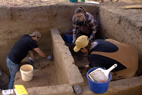 Clockwise from left, Gerad Smith, Audra Darcy and Lauren Bridgeman excavate an archaeological site at Hollembaek Hill southeast of Delta Junction in 2023. The work was funded in part by an endowment created by long-time Alaskan Nancy Eliason. Photo courtesy of Roger Topp.