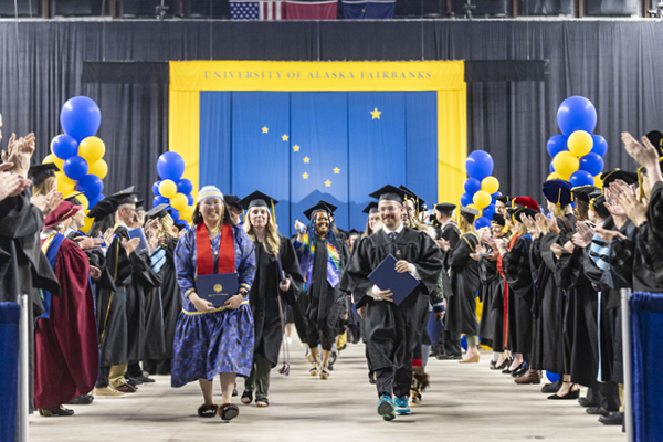 UAF graduates celebrate receiving their degrees on April 30, 2022, at the Carlson Center in Fairbanks. UAF commencement photos by JR Ancheta