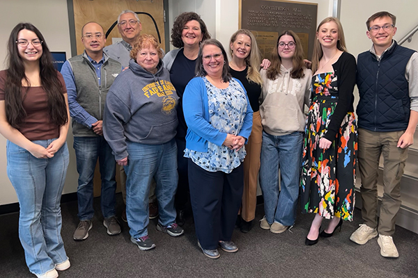 UAF Alumni Association board members and others meet with scholarship recipients during their spring 2026 meeting. Back row from left are Kevin Liu, ’07, ’15; Mischa Ellanna ’95; Theresa Bakker, UAFAA executive director; Rhonda Widener ’01; Reagan Jeffords; Claire Eberhart; and Jackson Nelson. Front row, from left, are Hazel Langley, Valerie Demming ’75 and Felicia Burud, UAF alumni relations associate director.