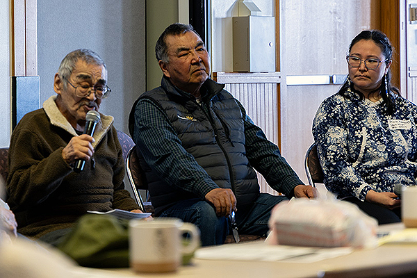 Kwigillingok Elder David John speaks as part of a panel at the Western Alaska Interdisciplinary Science Conference in Bethel, Alaska, April 7, 2026. To the left of the photo is Kwigillingok Elder Fred Phillip. To the right is Kipnuk Elder Tim Samson and Jessica Lewis-Nicori, originally from Chefornak.
