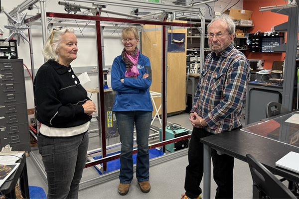 From left, Denise Thorsen, associate dean of academics for UAF's College of Engineering and Mines, visits with donors Rachel and Richard Kacsur at a lab in late 2025. Photo by Harry Need. 