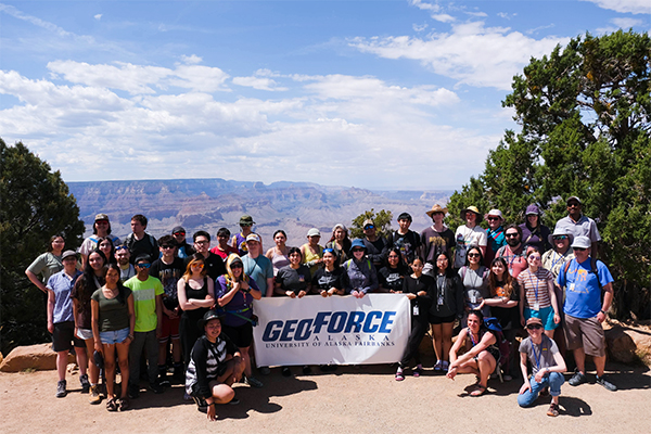 GeoFORCE Alaska’s fourth cohort — 31 high school students, 11 staff members, a bus driver and one mentor from Doyon Ltd. — gather at Desert View Lookout in Grand Canyon National Park on June 10, 2025.