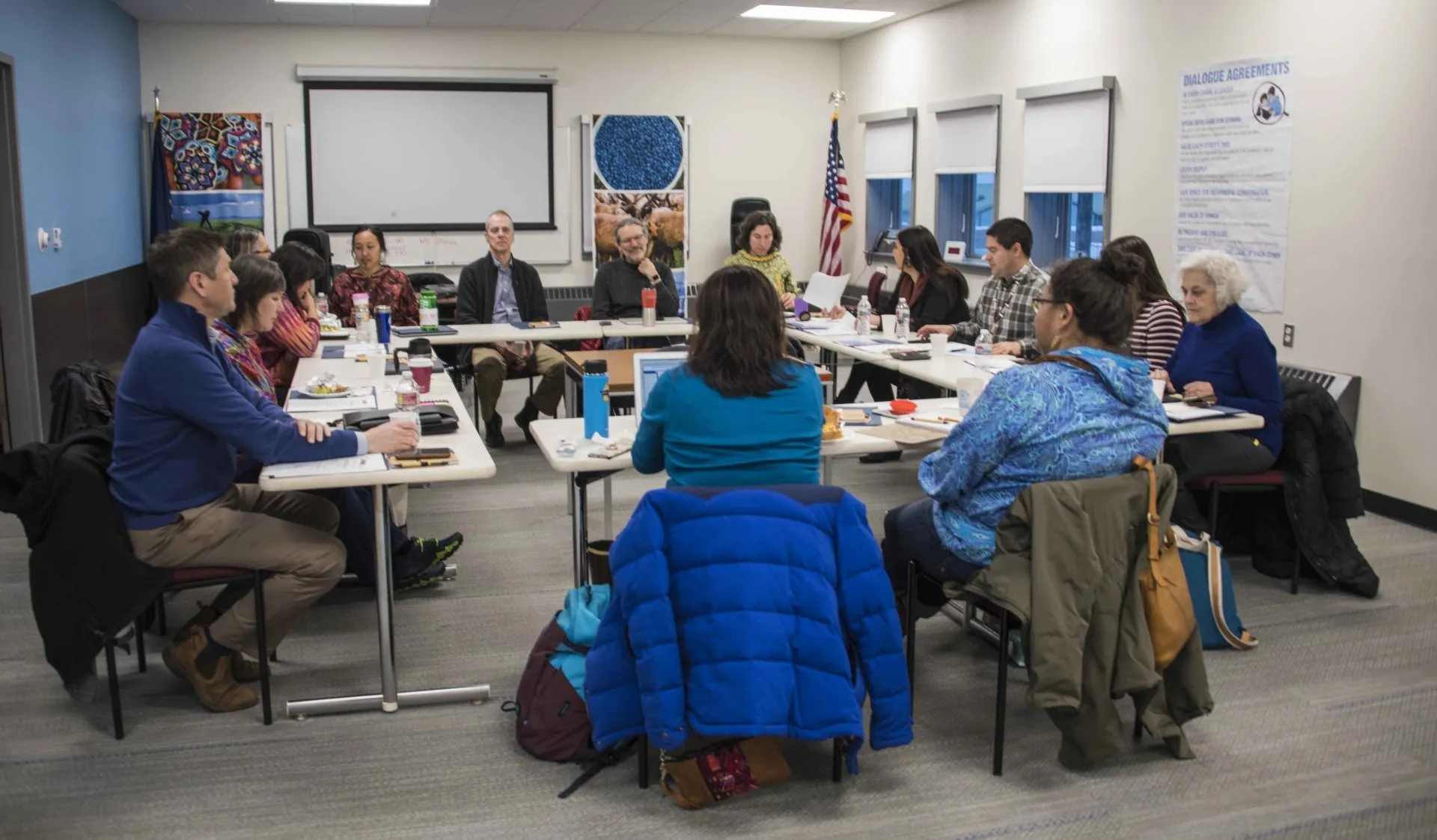 Participants around the table during a session.