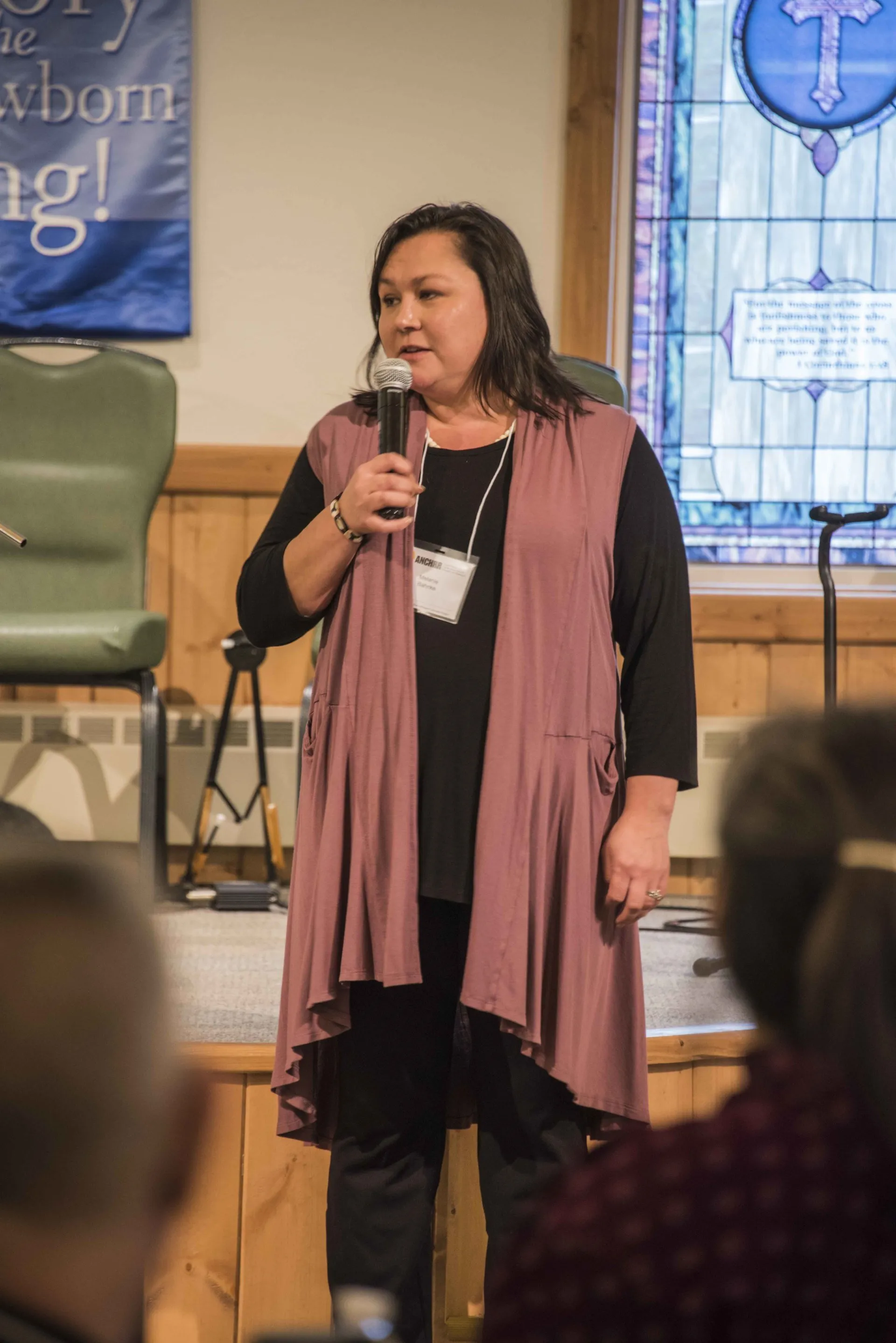 Melanie Banke speaking during a session.