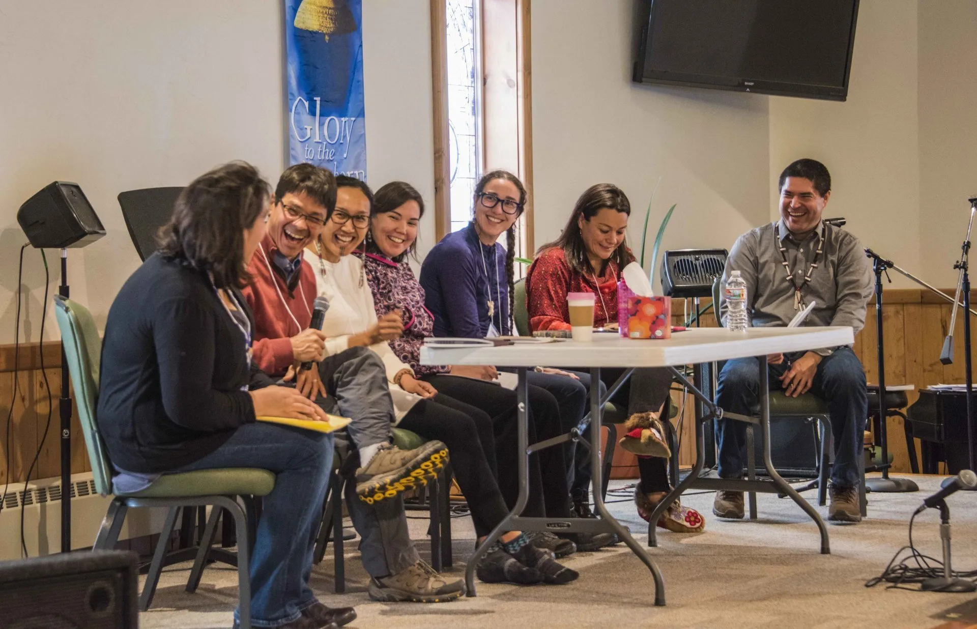 PhD panel up on stage.